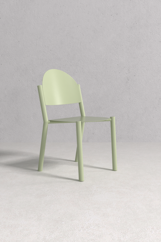 Catherine Chair with minimalist slender metal frame, handcrafted by Monarca in Colombia — dining, kitchen, or café seating.