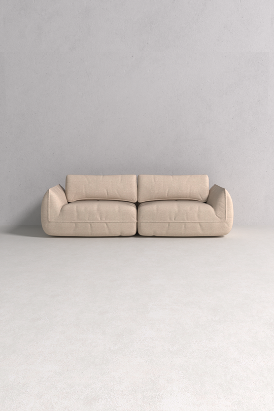 Tomyris Sofa with solid wood frame and plush fabric cushions, handcrafted by Monarca in Colombia.